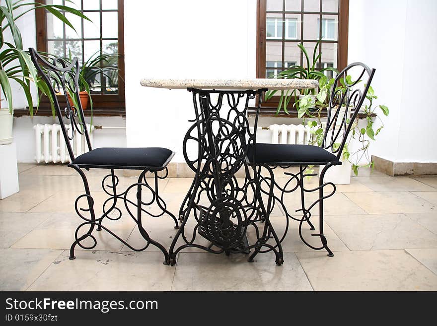 Two chairs and antique table. Two chairs and antique table