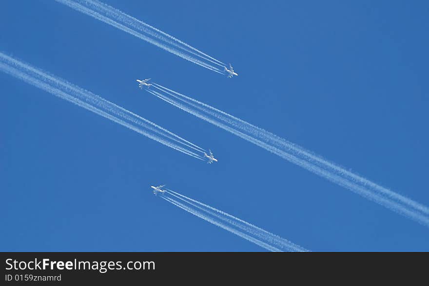 Fast planes on a air show. blue sky background. Fast planes on a air show. blue sky background