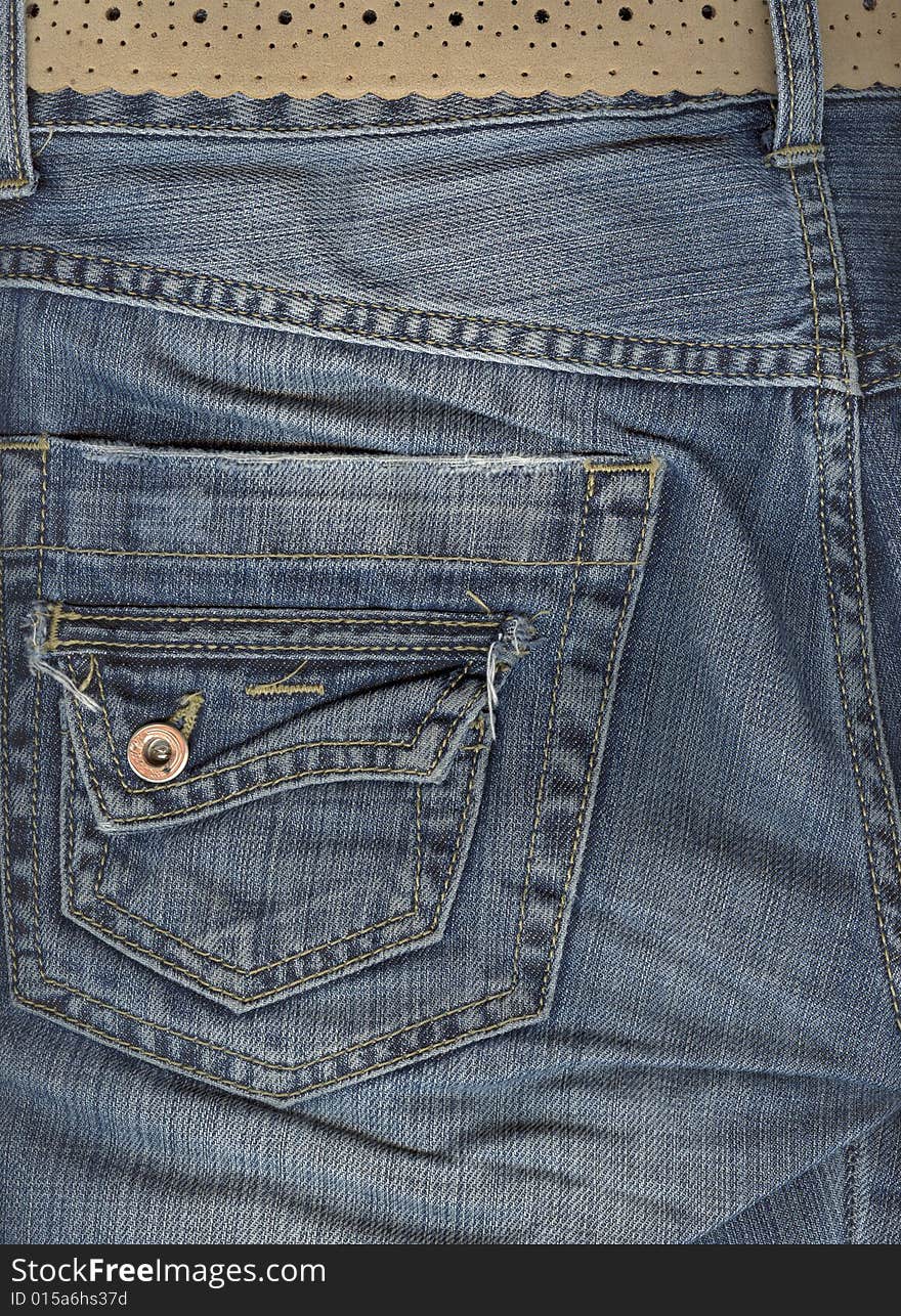 Close up of jeans back pocket.