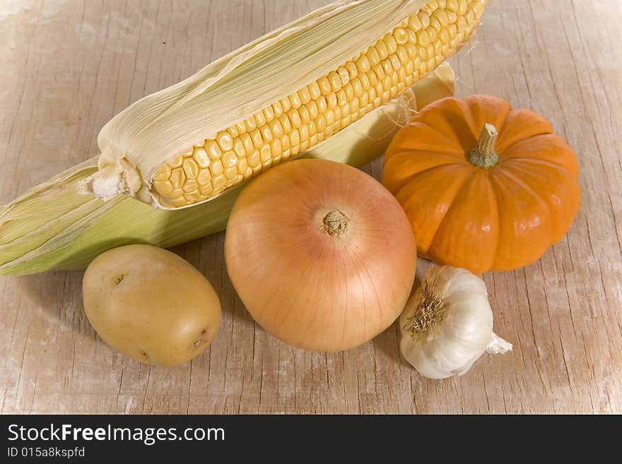 Fresh autumn vegetables on rusty painted wood. Fresh autumn vegetables on rusty painted wood