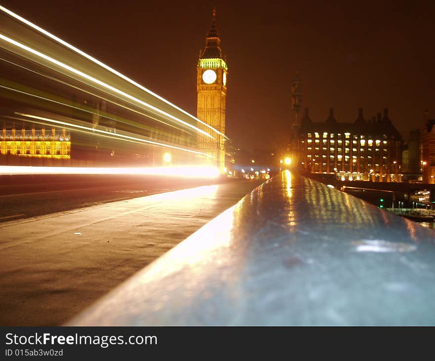 Londons Big Ben form bridge with passing lights