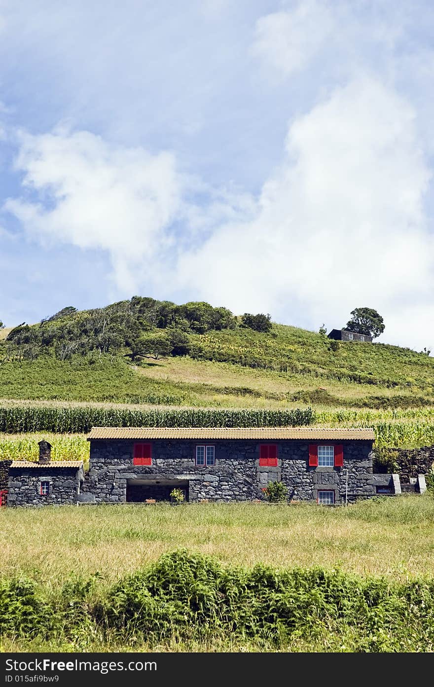 Beautiful farmhouse in a green landscape of Pico island, Azores, Portugal. Beautiful farmhouse in a green landscape of Pico island, Azores, Portugal