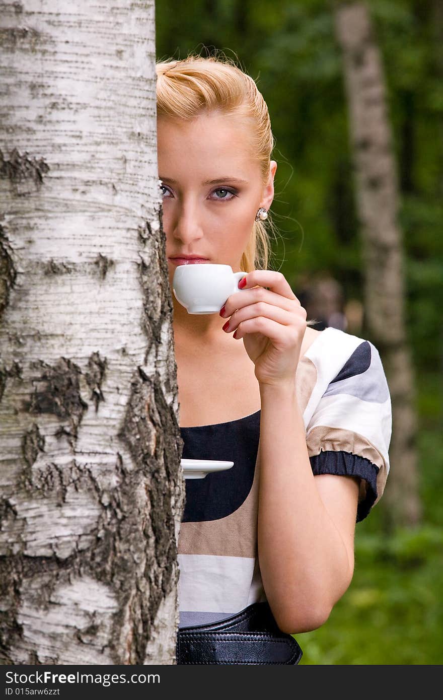 Beautiful young woman and coffee