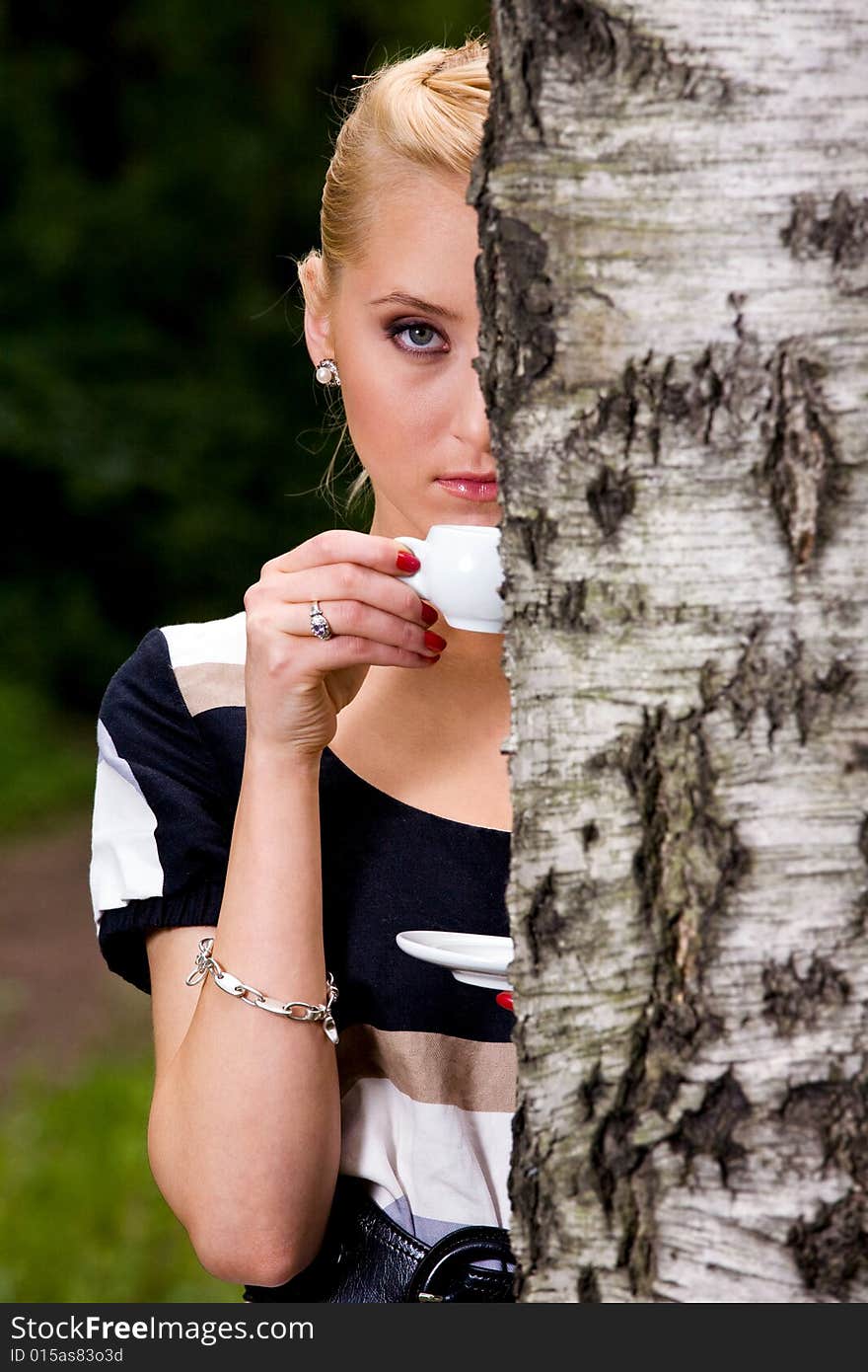 Beautiful young woman and coffee