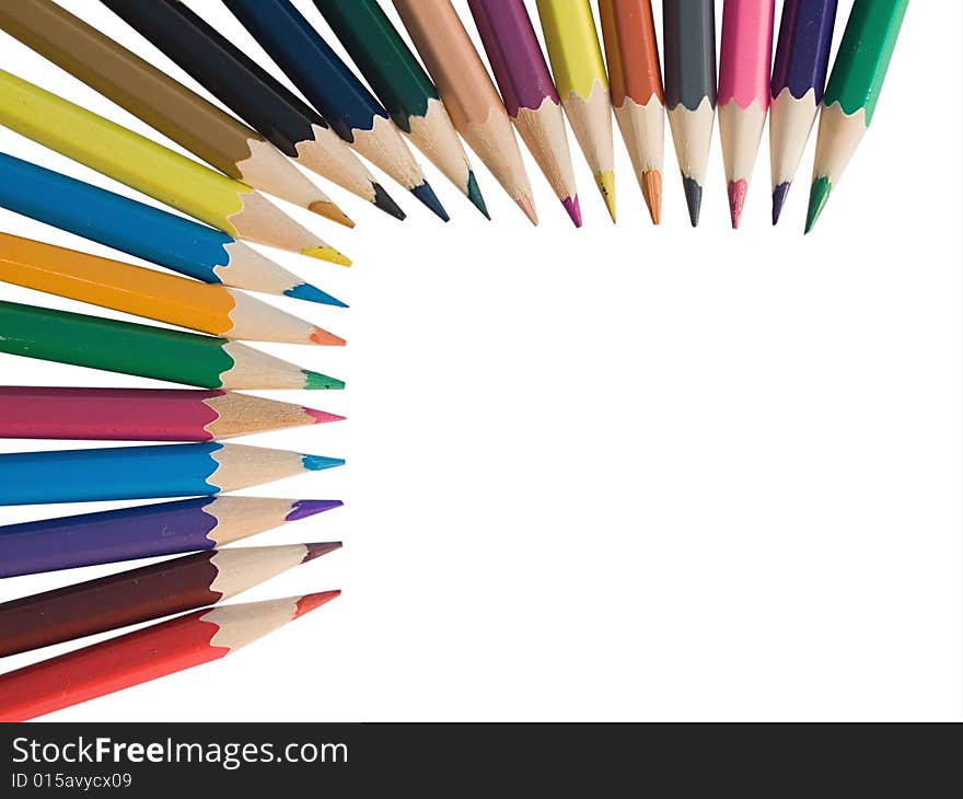 Assortment of colored pencils on white background