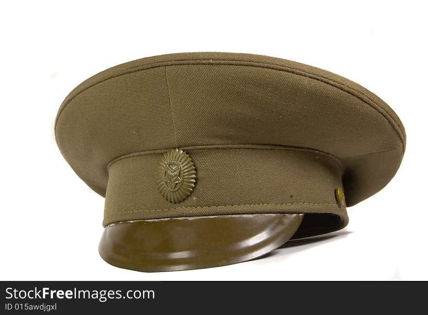 Green military cap on white ground