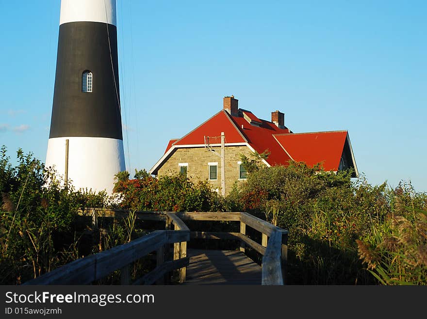 This is a shot of a lighthouse on Fire Island located off the coast of Long Island in New York state. This is a shot of a lighthouse on Fire Island located off the coast of Long Island in New York state.