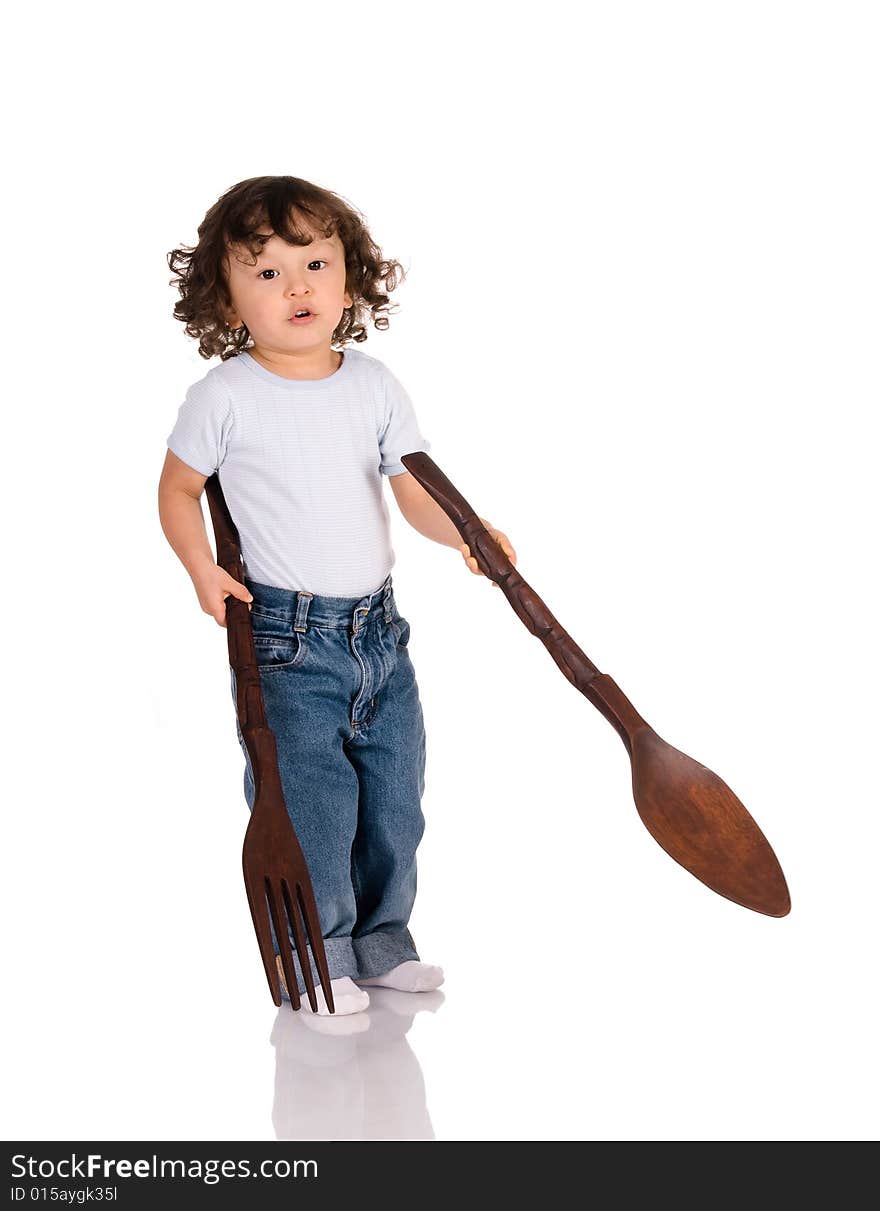 Child with spoon and fork