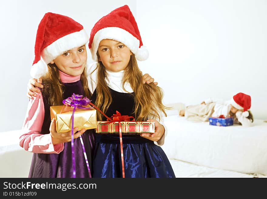 A little girl happy after receiving a present. A little girl happy after receiving a present