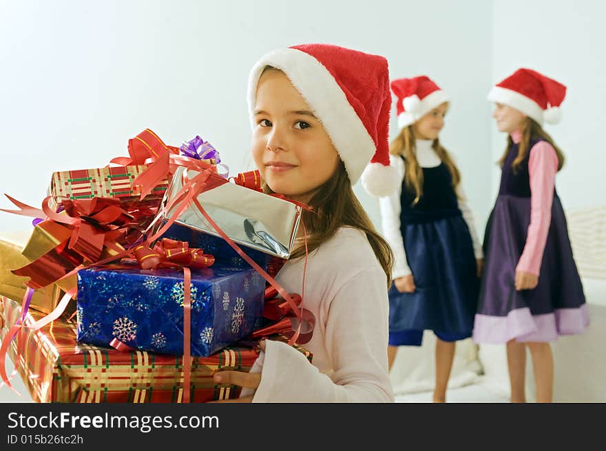 Three Little Girls With Christmas Presents