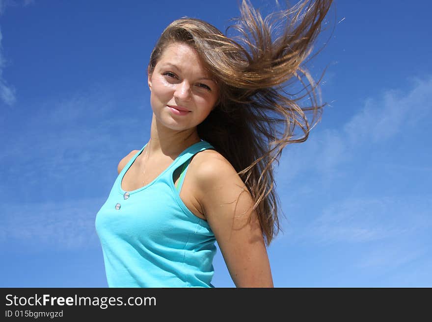 girl on a background of the dark blue sky