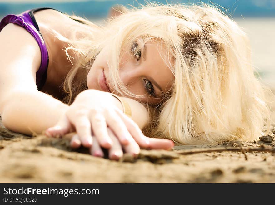 Portrait of beautiful woman on the beach. Portrait of beautiful woman on the beach