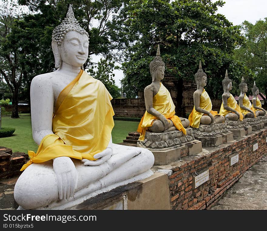 Buddha statue in Ayutthaya, Thailand, is a destination of many tourists