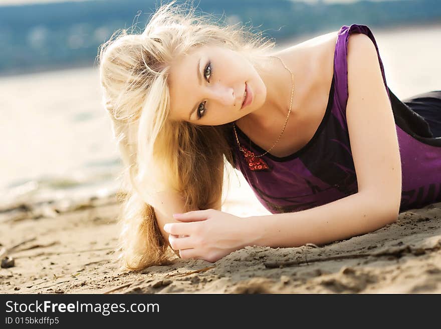 Portrait of beautiful woman on the beach. Portrait of beautiful woman on the beach