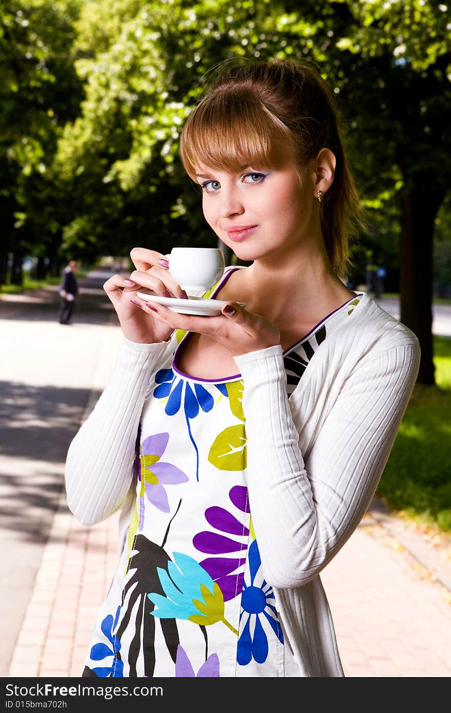 Beautiful young woman and coffee