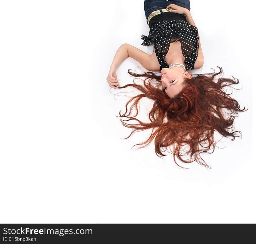 Beautiful long-haired girl isolated on white background