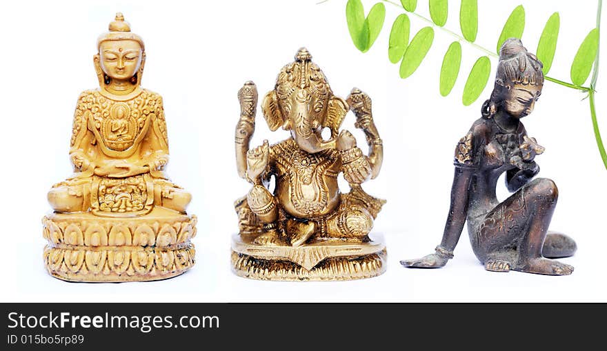 Lovely figures of buddha, ganesh and an indian girl against white background. Lovely figures of buddha, ganesh and an indian girl against white background