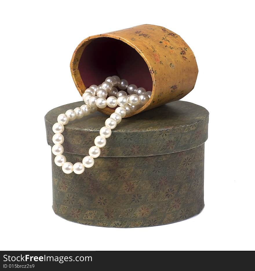 Pearls sitting in decorative boxes