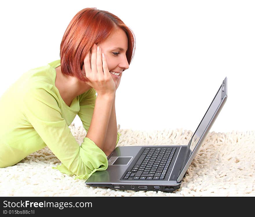 Young girl with laptop isolated on white background