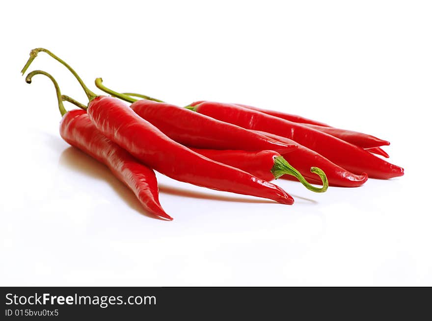 Group of red pepper on the white. Group of red pepper on the white