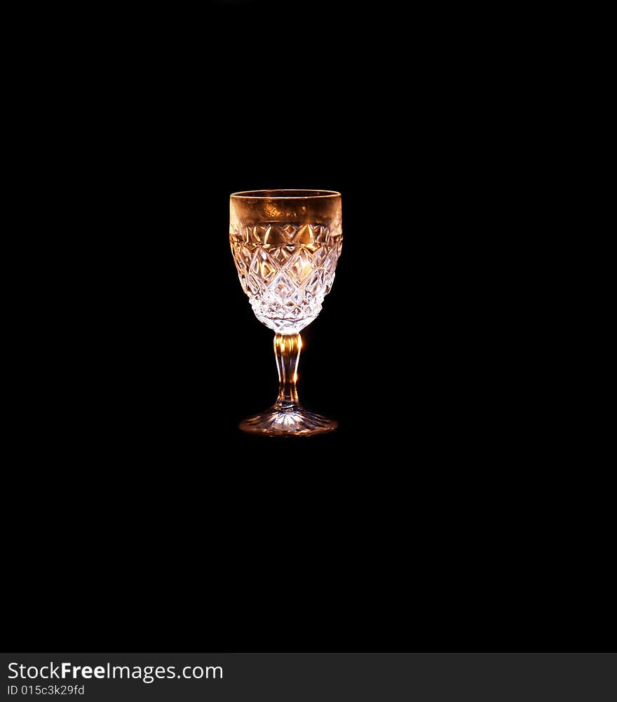 Glasses in the black background with flash. Glasses in the black background with flash