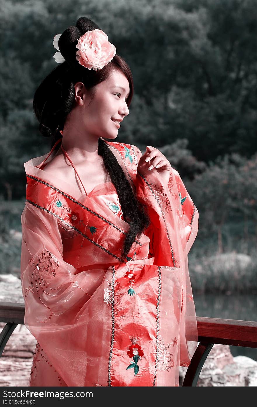 A girl in Chinese ancient dress. She is so beautiful and lovely. A girl in Chinese ancient dress. She is so beautiful and lovely.