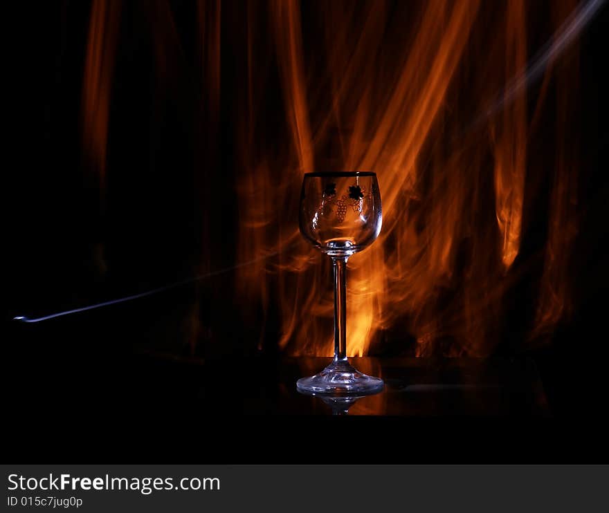 Glasses in the black background with flash. Glasses in the black background with flash