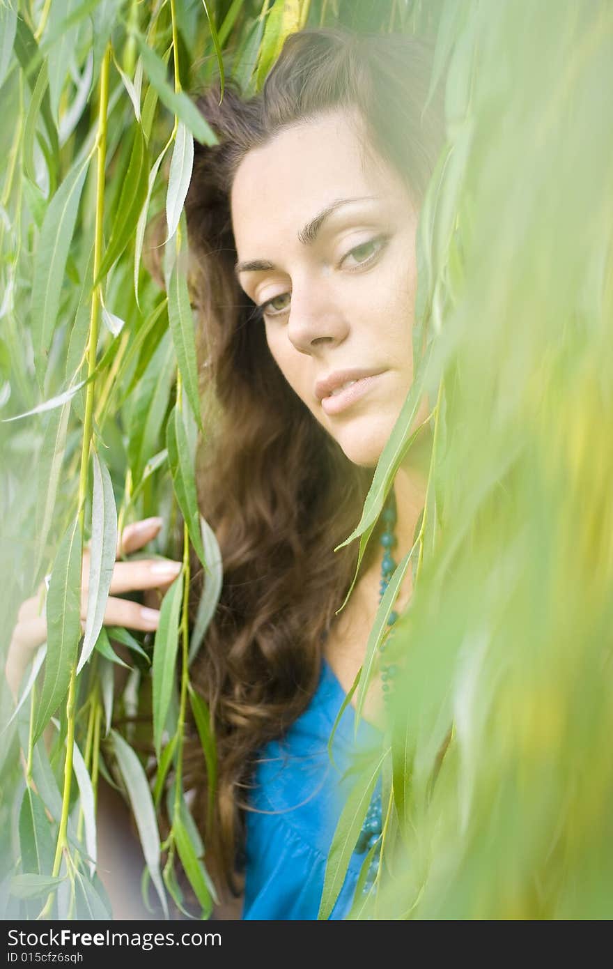 Beautiful woman in leaves