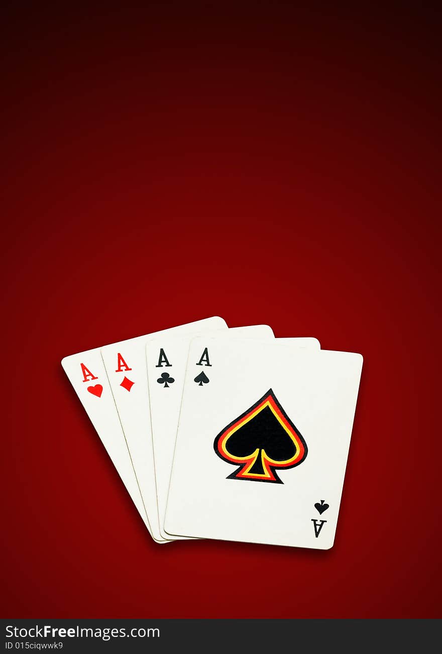 Four aces, poker cards on white background, isolated, clipping path excludes the shadow.