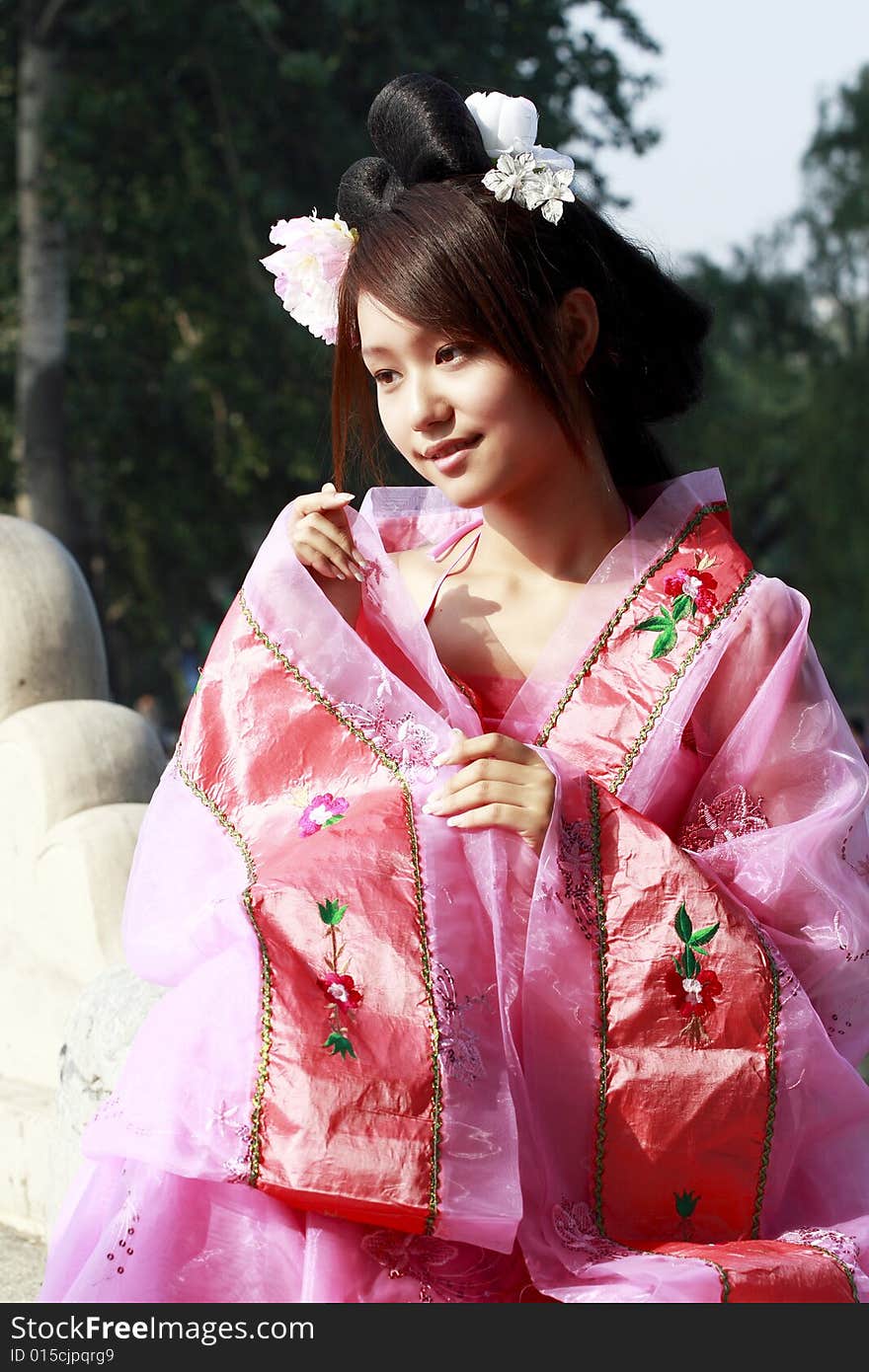 A girl in Chinese ancient dress. She is so beautiful. A girl in Chinese ancient dress. She is so beautiful