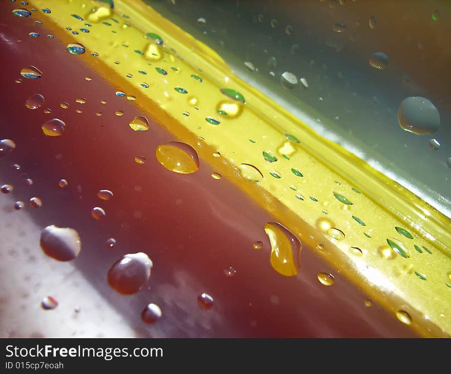 Water drops over a plastic