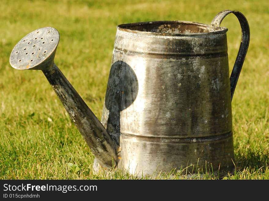Watering can in a garden