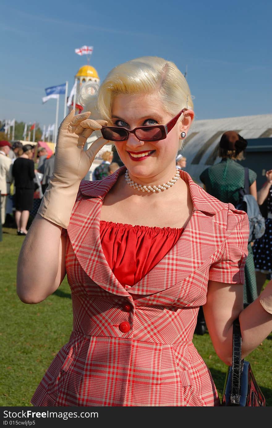 Fifties vintage costume at Goodwood Revival event, UK. Fifties vintage costume at Goodwood Revival event, UK