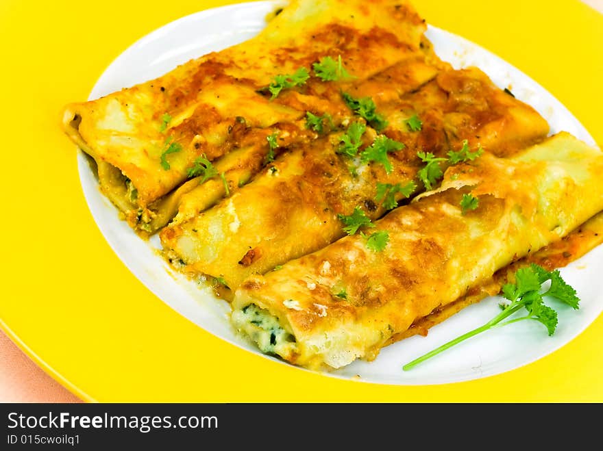 Cannelloni with stuffing of meat and cheese- fresh baked.