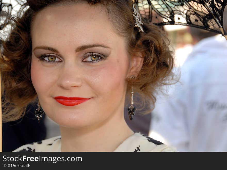 Closeup of pretty retro girl at Goodwood Revival event, UK