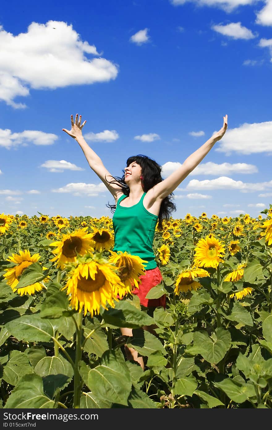 Woman In The Field Of Sunflowers