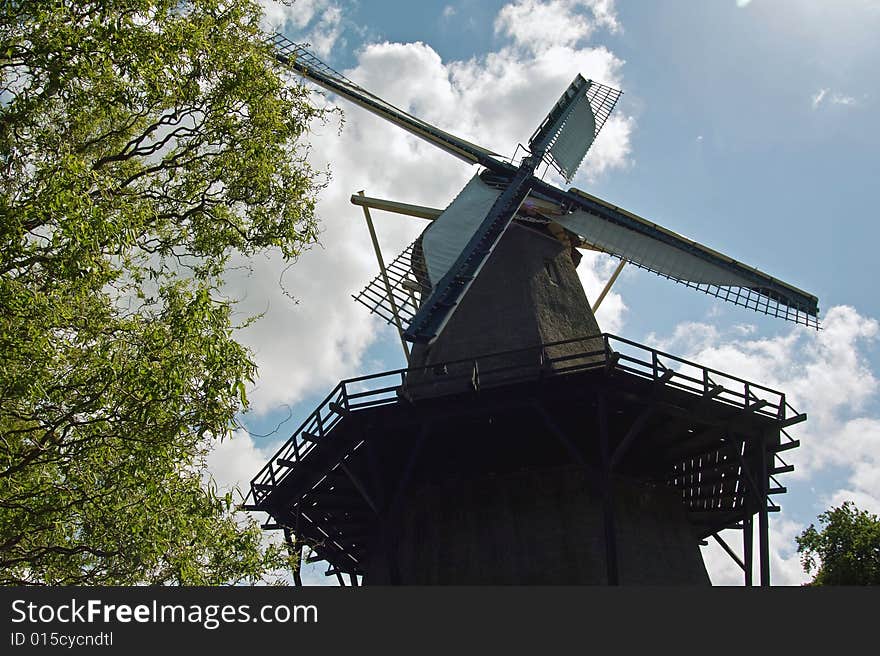 The Dutch windmill, the Zandhaas (the Sand-hare) on a sunny day. The windmill is still used for wheat grinding on a daily basis.