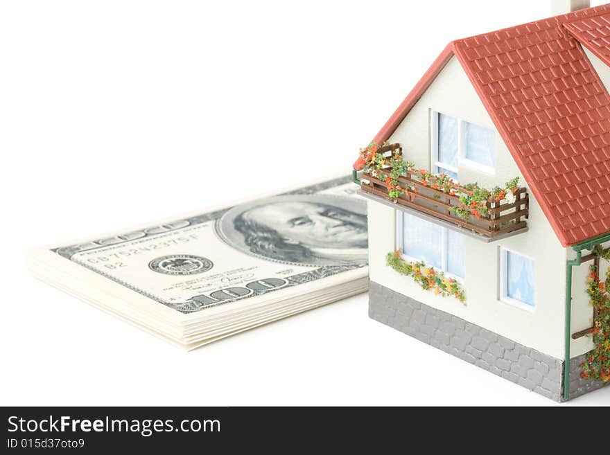 Miniature House and Money. Buying house concept