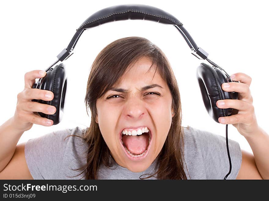 Young woman listening music with headphones