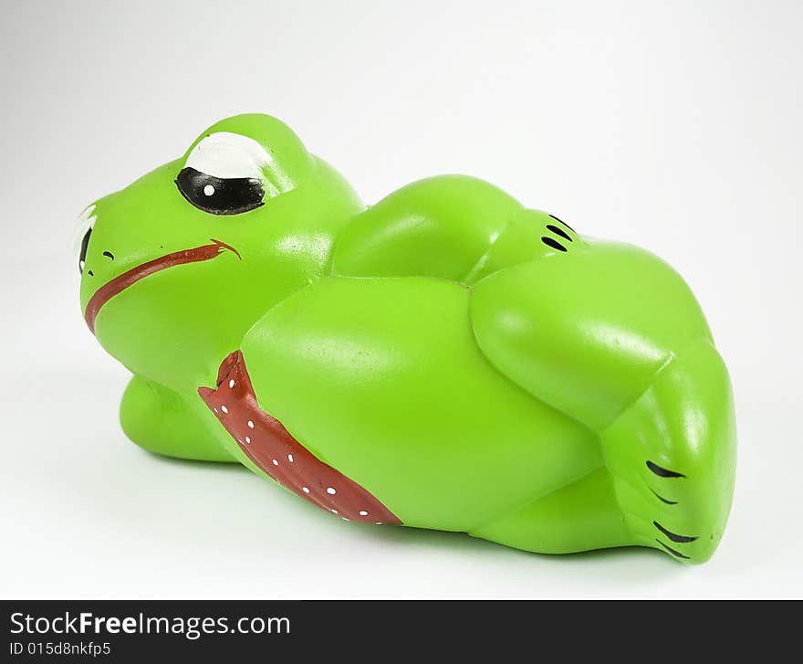 Ceramic made frog in lazy position. Ceramic made frog in lazy position.