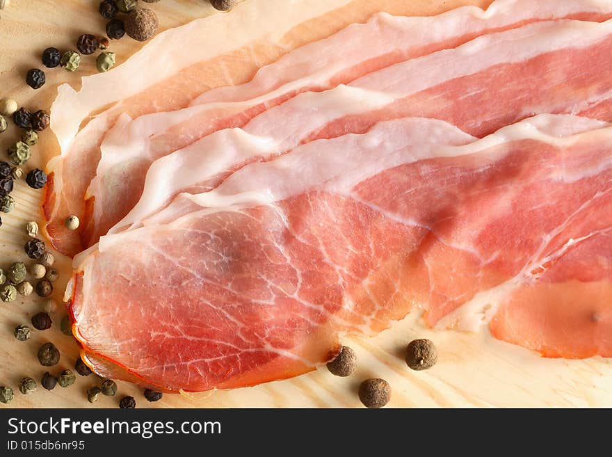 Pepper grains and slices of ham