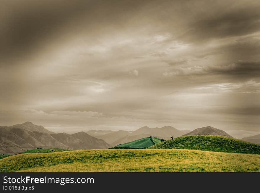 Beautiful hdr landscape with mountains and cloudscape. Beautiful hdr landscape with mountains and cloudscape