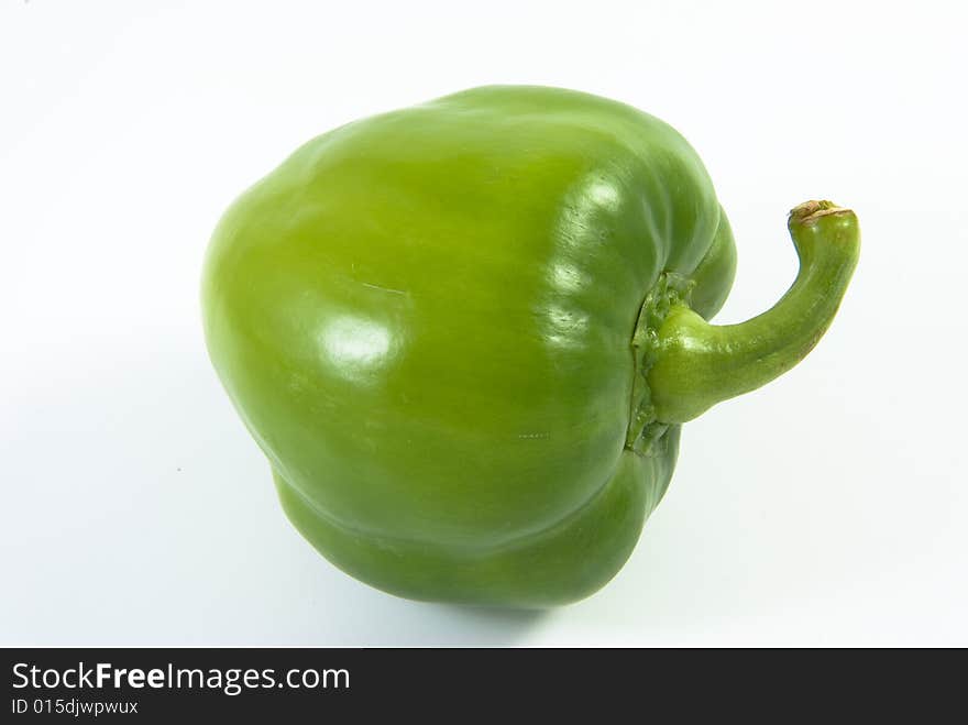 Green bell pepper on white background