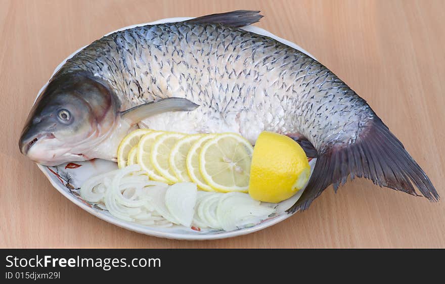 Ingredients to the recipe 3 (fish, lemon, onion). Ingredients to the recipe 3 (fish, lemon, onion)