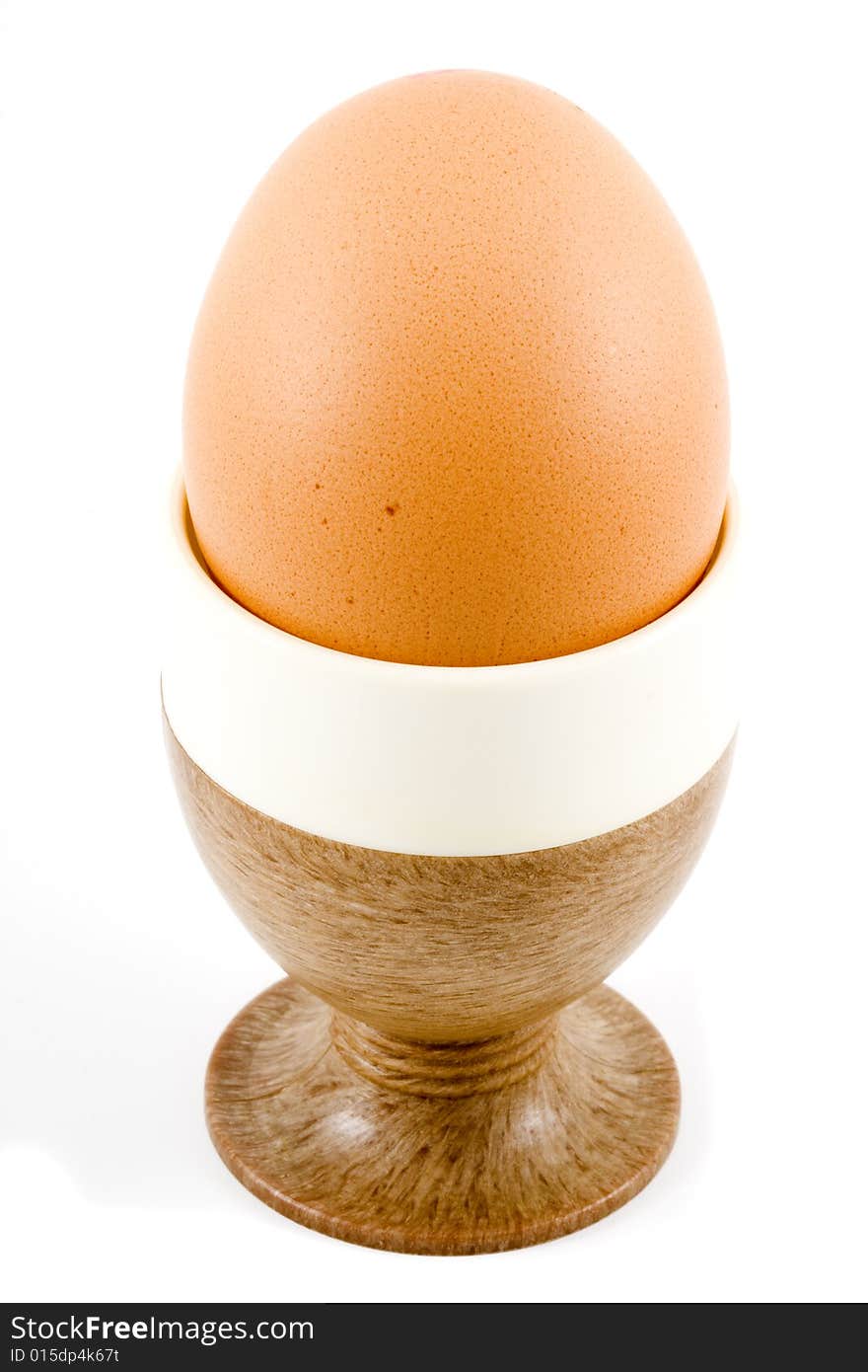 A brown soft boiled egg in the eggcup