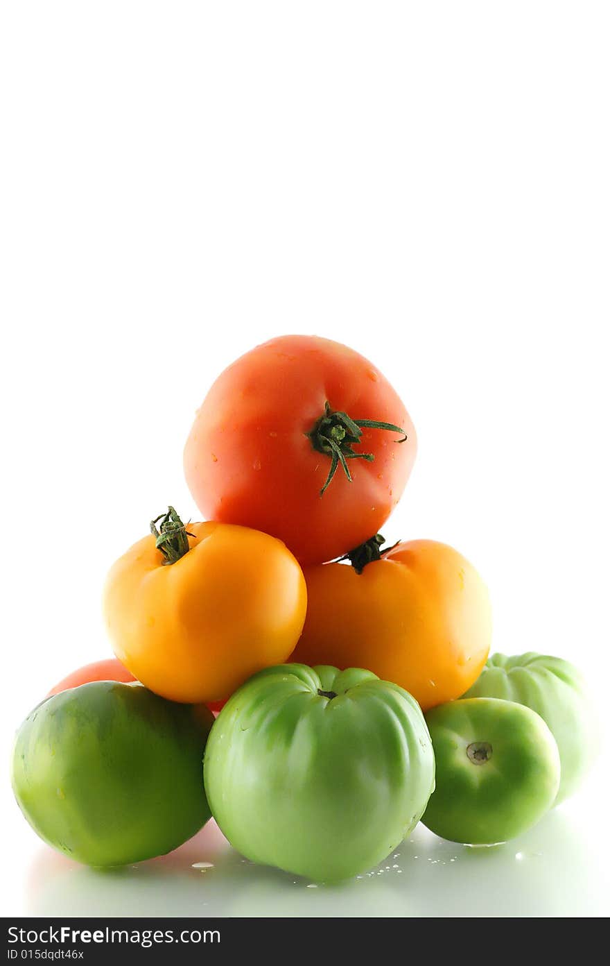 Some freshness multicolor tomato on white background. Some freshness multicolor tomato on white background