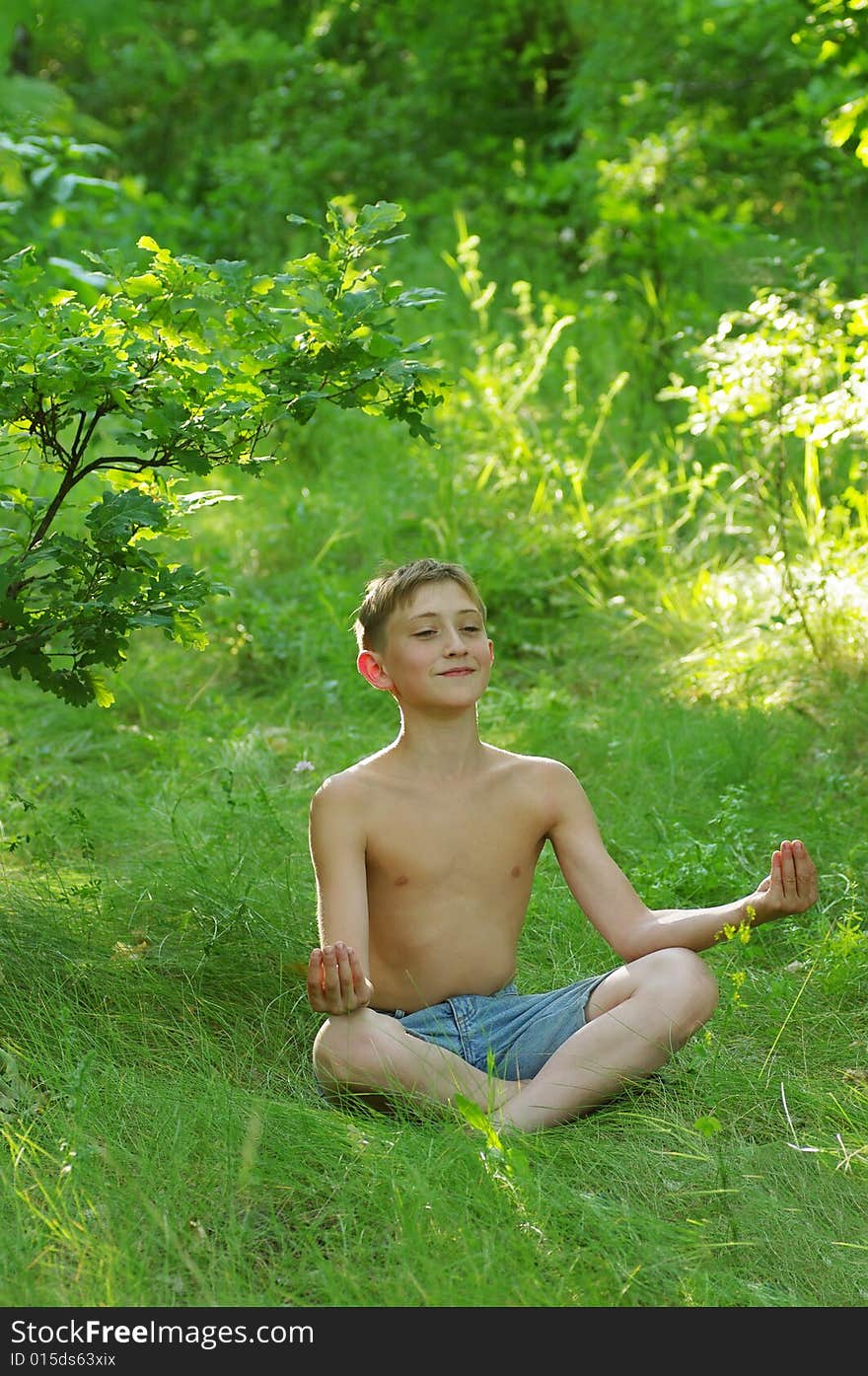 A shot of boy on grass