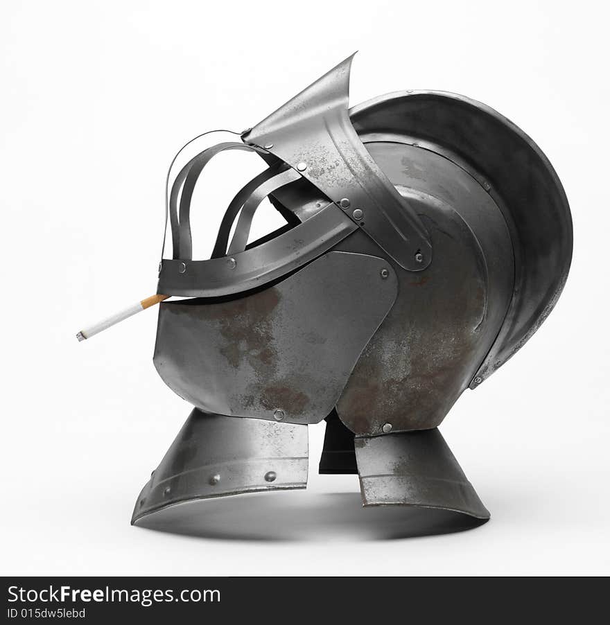 Image of a knight's metal helmet on a white background. Image of a knight's metal helmet on a white background