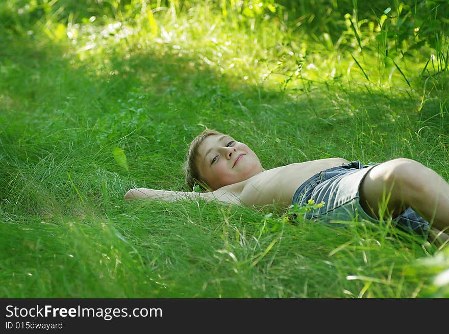 A shot of boy on grass