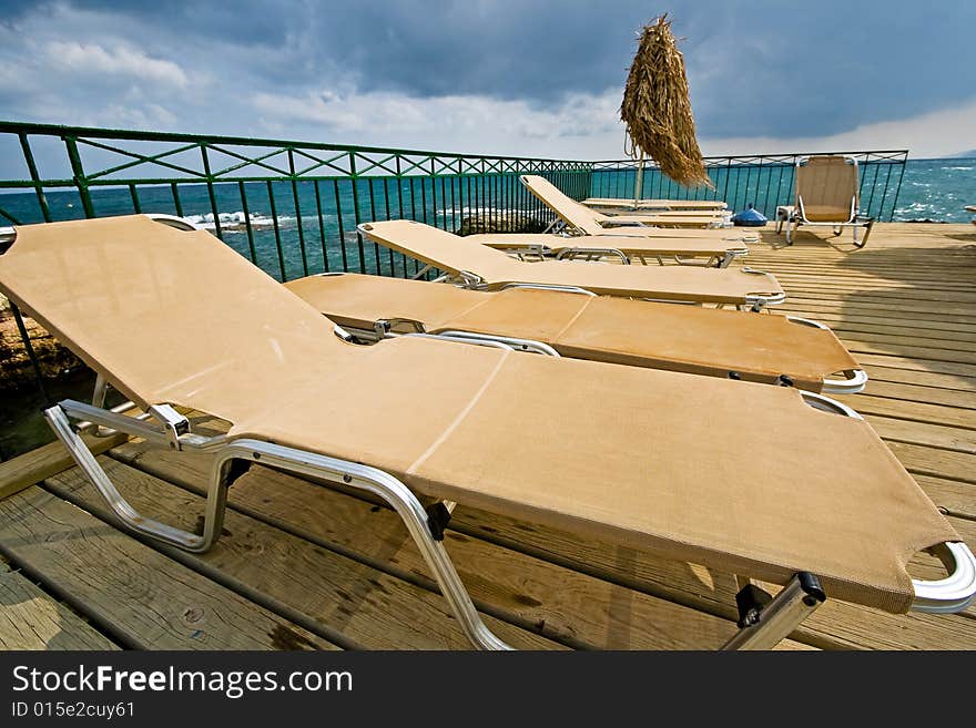 Beach chairs near to the sea